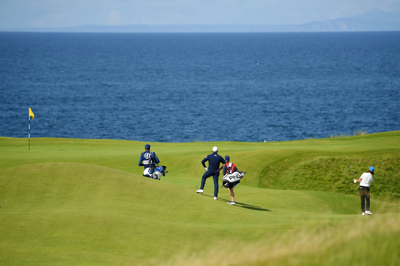 Lowry watches on as Fleetwood plays to the 5th at Royal Portrush